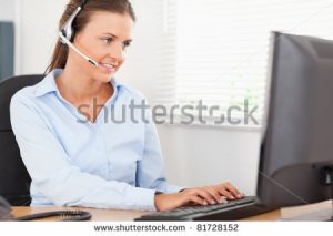 Shutterstock - stock-photo-a-businesswoman-with-headset-helping-a-customer-81728152